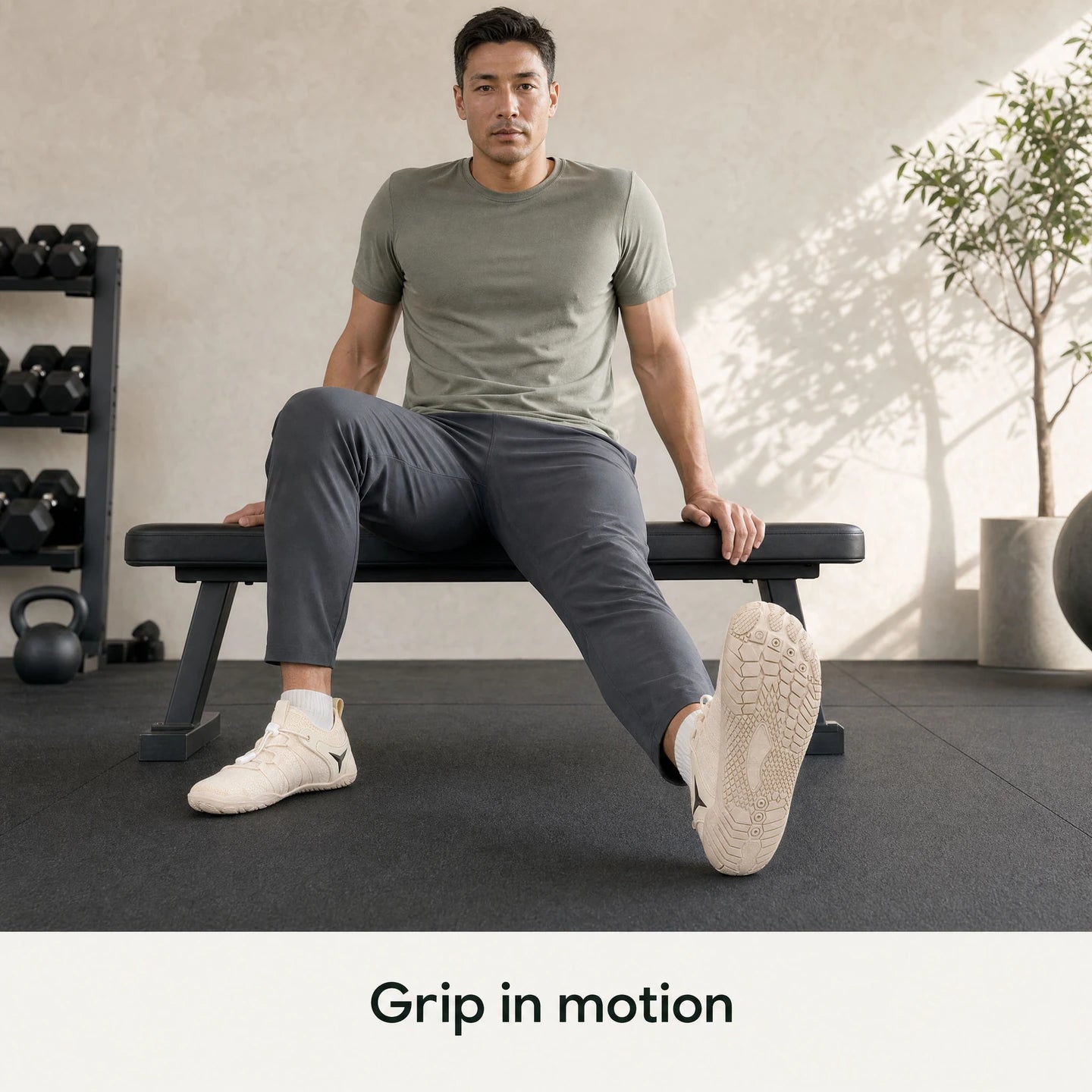 Seated athlete showing the beige Barevon Original textured outsole.