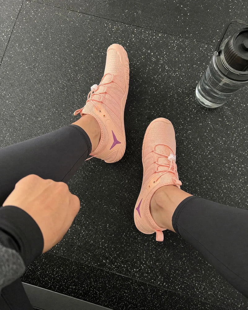 Coral Barevon shoes after a gym session.
